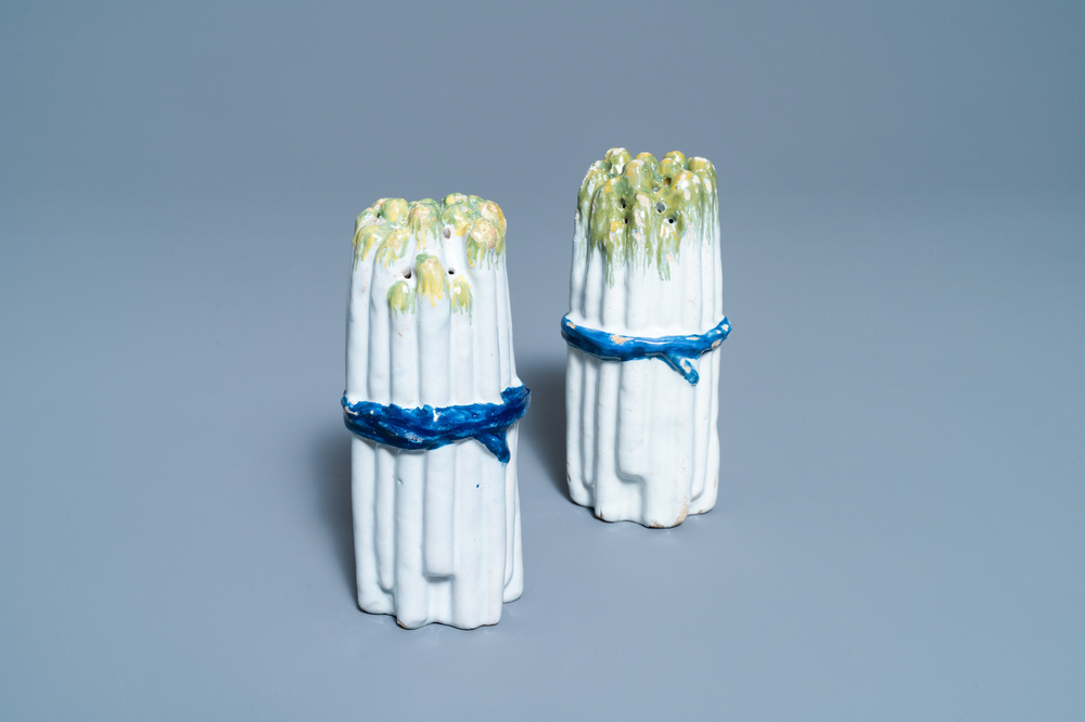 A pair of polychrome Brussels faience asparagus-shaped casters, 18th C.